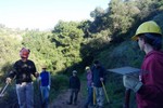 Ray Ford instucting on construction of waterbars/rolling grade dips.